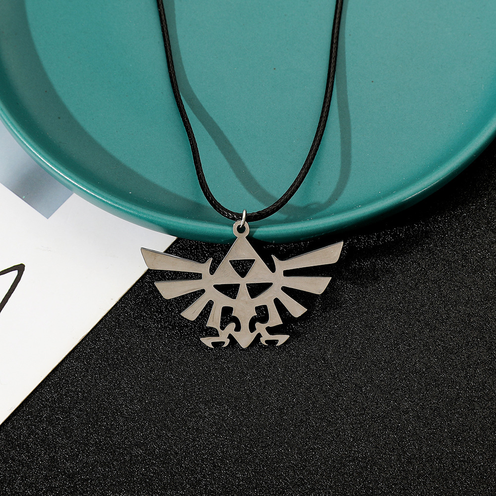 Vintage Collectible Show - Vintage Hollow Winged Triangle Symbol Necklace